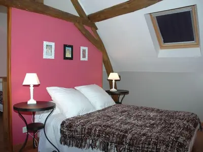 Un ou plusieurs lits dans un hébergement de l'établissement Gîte authentique à Brizay avec jardin privé et piscine - FR-1-381-238