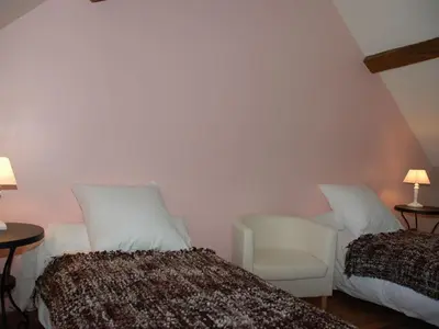 Un ou plusieurs lits dans un hébergement de l'établissement Gîte authentique à Brizay avec jardin privé et piscine - FR-1-381-238