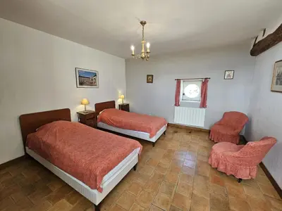 Un ou plusieurs lits dans un hébergement de l'établissement Charmante maison de campagne dans une ferme rénovée - FR-1-381-262