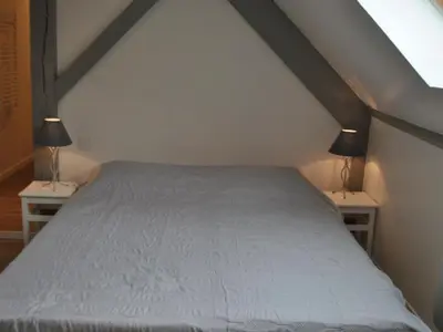 Un ou plusieurs lits dans un hébergement de l'établissement Gîte de charme avec piscine partagée près de Tours - FR-1-381-393