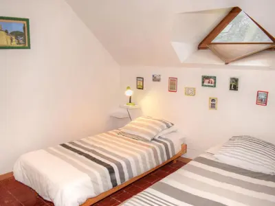Un ou plusieurs lits dans un hébergement de l'établissement Gîte charmant en Touraine avec jardin et WIFI - FR-1-381-444