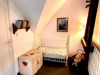 Un ou plusieurs lits dans un hébergement de l'établissement Gîte confortable avec parc boisé, activités familiales et équipements modernes près de la Loire - FR-1-381-470