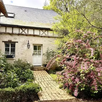 Gîte confortable avec parc boisé
