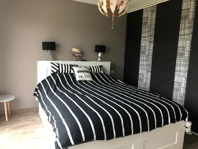 Un ou plusieurs lits dans un hébergement de l'établissement lily's rooms