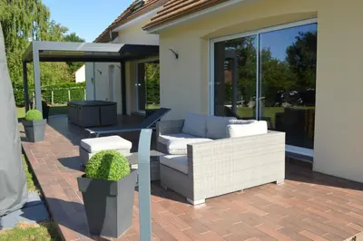 Coin salon dans l'établissement Maison individuelle