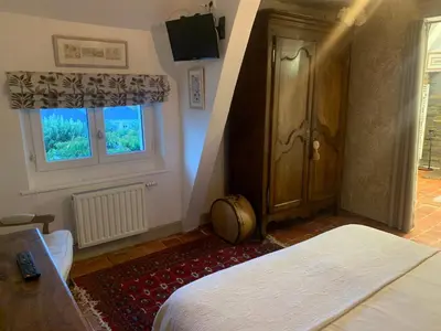 Un ou plusieurs lits dans un hébergement de l'établissement Le Clos Mademoiselle