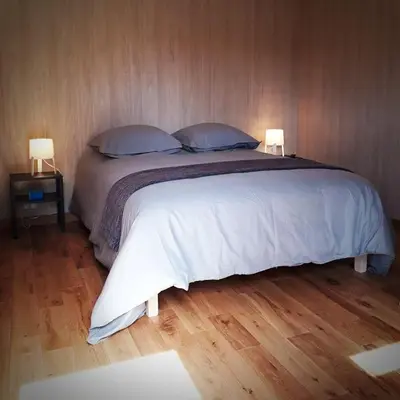 Un ou plusieurs lits dans un hébergement de l'établissement Manège de la Chapinière - DadaLoge tiny-house