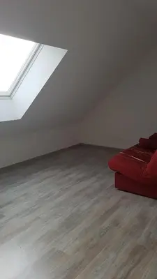 Coin salon dans l'établissement Chambre chez habitant