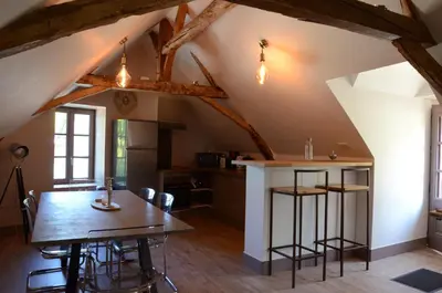 Cuisine ou kitchenette dans l'établissement La Suite Du Marquis