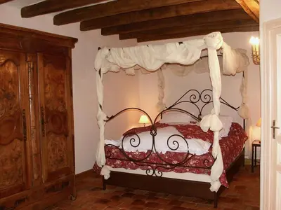 Un ou plusieurs lits dans un hébergement de l'établissement Séjour Authentique dans un Ancien Moulin - Gîte Confort avec Jardin Privatif - FR-1-381-475