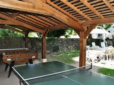 Tennis de table au sein de l'établissement Séjour Authentique dans un Ancien Moulin - Gîte Confort avec Jardin Privatif - FR-1-381-475 ou à proximité