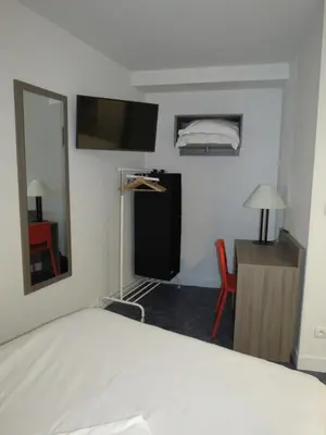 Cuisine ou kitchenette dans l'établissement Hotel le Faisan