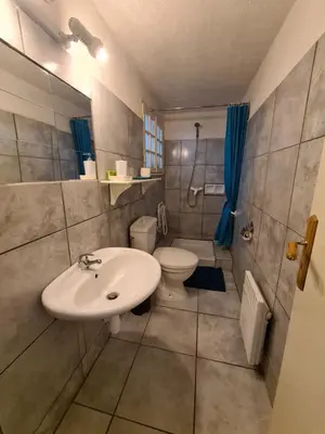 Salle de bains dans l'établissement Studios Les Iris