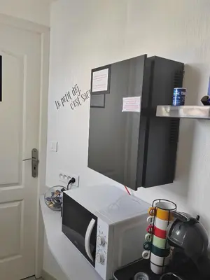 Cuisine ou kitchenette dans l'établissement L'Escale Chambre chez l'habitant