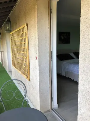 Un ou plusieurs lits dans un hébergement de l'établissement Cottage Jardin Duplex of 70 m for 2 people 1 bedroom 2 bathrooms