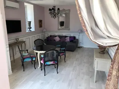 Coin salon dans l'établissement Cottage du chateau for 4 people 90 M- 2 bedrooms 2 bathrooms pool