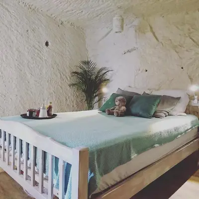 Un ou plusieurs lits dans un hébergement de l'établissement Les Gîtes des Châteaux, gîtes troglodytiques