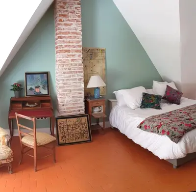 Un ou plusieurs lits dans un hébergement de l'établissement Bed & Breakfast - La closerie de la Fuye