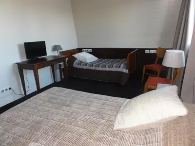 Un ou plusieurs lits dans un hébergement de l'établissement Hotel La Longue Vue