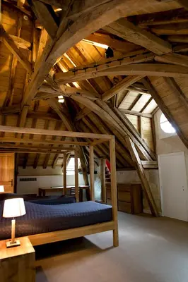 Un ou plusieurs lits dans un hébergement de l'établissement Château de Perreux, The Originals Collection