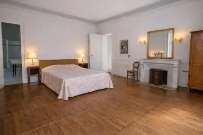 Un ou plusieurs lits dans un hébergement de l'établissement L'intemporel, gîte de charme pour 4 à 5 personnes