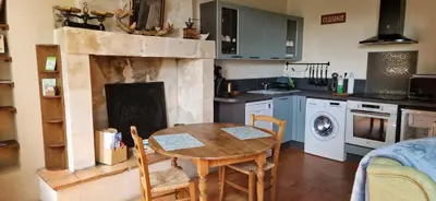 Cuisine ou kitchenette dans l'établissement Le Petit Gite De La Promenade