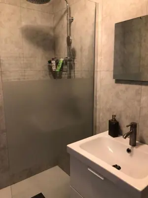 Salle de bains dans l'établissement Le Petit Lecoy