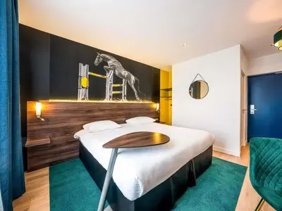 Un ou plusieurs lits dans un hébergement de l'établissement ibis Styles Saumur Gare Centre
