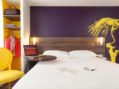Un ou plusieurs lits dans un hébergement de l'établissement ibis Styles Saumur Gare Centre