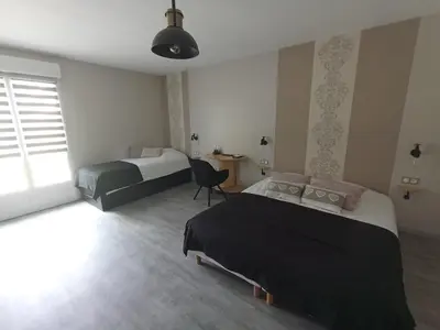 Un ou plusieurs lits dans un hébergement de l'établissement Chambres d'hotes 
