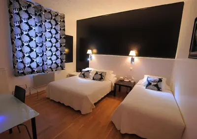 Un ou plusieurs lits dans un hébergement de l'établissement Hotel Italia