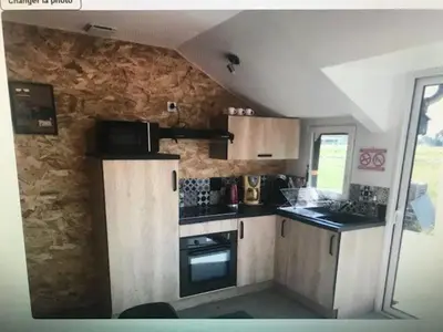 Cuisine ou kitchenette dans l'établissement LE GRAND PARADIS