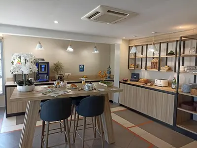 Cuisine ou kitchenette dans l'établissement Campanile Saumur