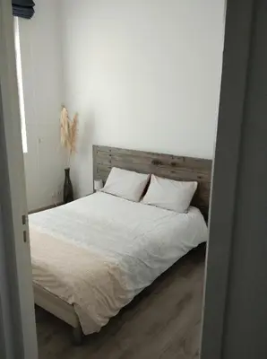 Un ou plusieurs lits dans un hébergement de l'établissement Appartement de charme bord de Loire