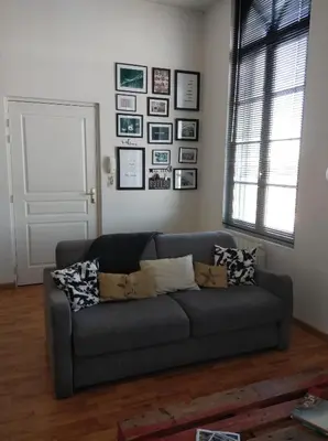 Coin salon dans l'établissement Appartement de charme bord de Loire