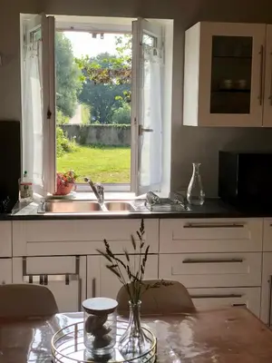 Cuisine ou kitchenette dans l'établissement La Vove