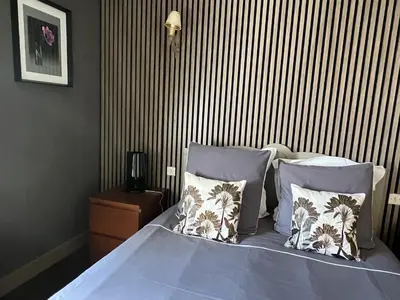 Un ou plusieurs lits dans un hébergement de l'établissement Chambres d'hôtes & Spa Les Perce Neige