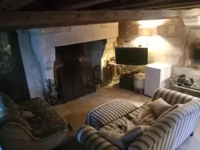 Télévision ou salle de divertissement dans l'établissement Le Mouton