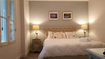 Un ou plusieurs lits dans un hébergement de l'établissement Hôtel Chez Jacqueline