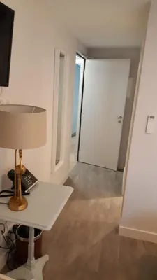 Télévision ou salle de divertissement dans l'établissement Hôtel Chez Jacqueline