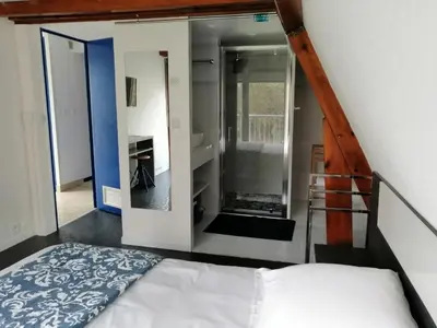 Un ou plusieurs lits dans un hébergement de l'établissement CHAMBRE INDEPENDANTE DANS UN PARC