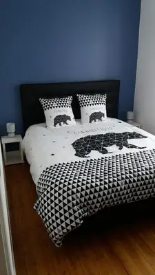 Un ou plusieurs lits dans un hébergement de l'établissement Appartement Taïko