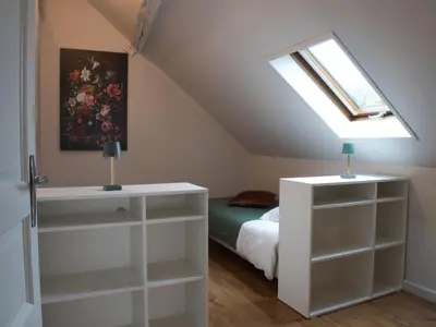 Un ou plusieurs lits dans un hébergement de l'établissement Cottage l'Orée du Cher