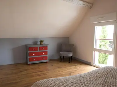 Un ou plusieurs lits dans un hébergement de l'établissement Cottage l'Orée du Cher
