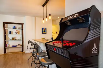 Salle de jeux dans l'établissement Happy Loft - Centre historique + parking privé