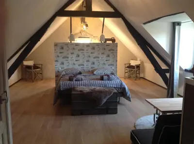 Coin salon dans l'établissement Le Moulin de Chareau