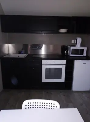 Cuisine ou kitchenette dans l'établissement gite odeau