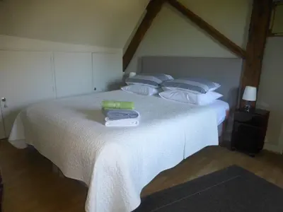 Un ou plusieurs lits dans un hébergement de l'établissement La Maison du Closier