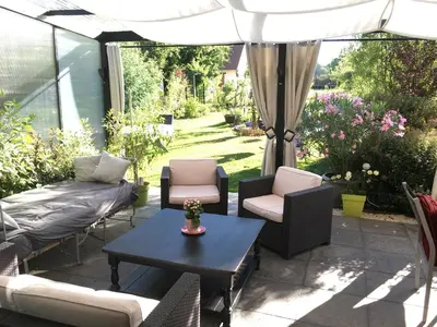 Jardin de l'établissement Chez Christophe et Cécile sur le circuit des 24 heures du Mans