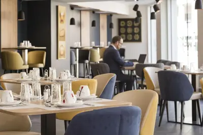 Restaurant ou autre lieu de restauration dans l'établissement Appart'hôtel Odalys City - Le Mans Centre Palais des Congrès